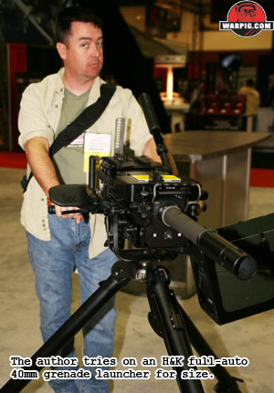 Bill Mills behind a 40mm full-auto grenade launcher from H&K